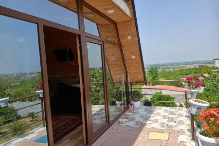 کلبه سوئیسی با جکوزی و ویو جزیره در بابلکنار