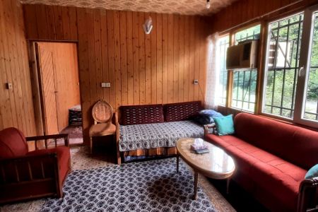 کلبه چوبی کنار رودخانه در بابلکنار - قرآن تالار