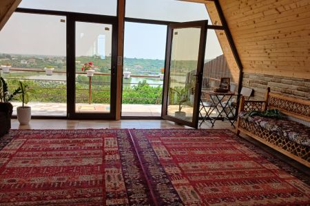 کلبه سوئیسی با جکوزی و ویو جزیره در بابلکنار