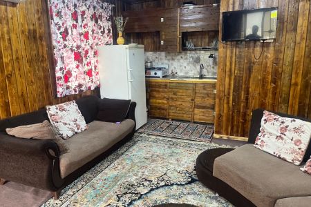 Two-Story Wooden Cabin in Taskuh