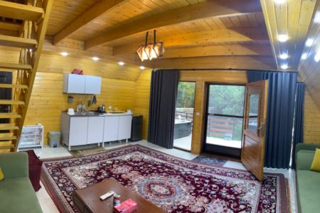 کوخ سویسری مع جاکوزی بجانب النهر فی بابل کنار