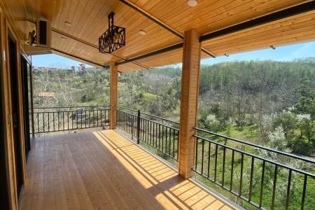 کلبه چوبی با وان جکوزی در بابلکنار - درازکلا