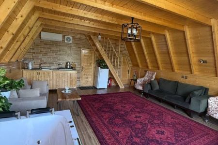 کلبه سوئیسی جکوزی دار در بابلکنار - هلی خال