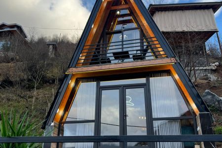 کلبه سوئیسی تنکابن - هلوکله