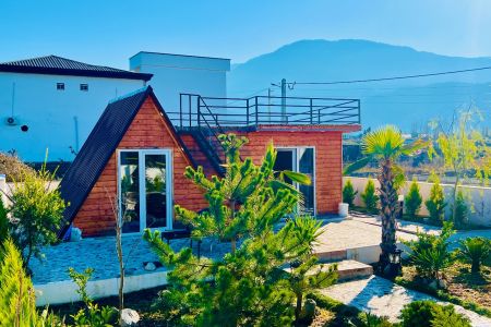 کلبه چوبی در متل قو - شهرک یاس