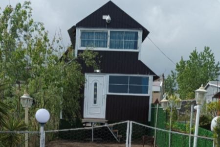 کلبه چوبی ساحلی در زیباکنار - باغ محله