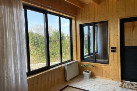 کلبه چوبی با وان جکوزی در توساسان رامسر