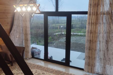 کلبه سوئیسی با تراس در اسالم - سیاه بیل