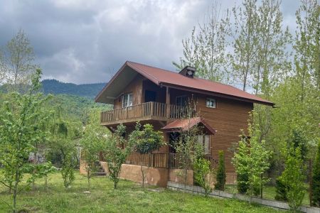Two-Story Wooden Cabin in Taskuh