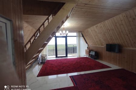 کلبه سوئیسی نزدیک ساحل در اسالم - میانده