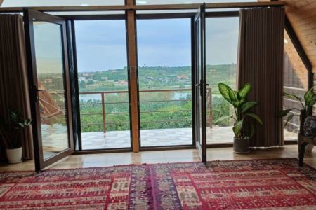 کلبه سوئیسی با جکوزی و ویو جزیره در بابلکنار
