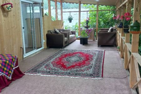 خانه به همراه بالکن چوبی در رانکوه - ط ۲