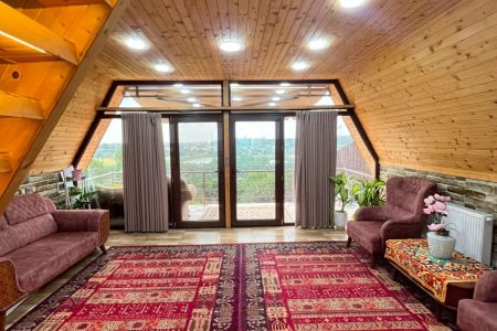 کلبه سوئیسی با جکوزی و ویو جزیره در بابلکنار
