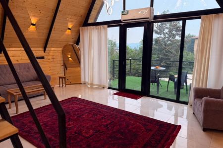 کلبه سوئیسی با جکوزی در بابلکنار - فرامرزکلا