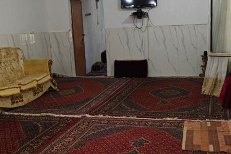 خانه حیاط دار کنار رودخانه در پاوه - داریان